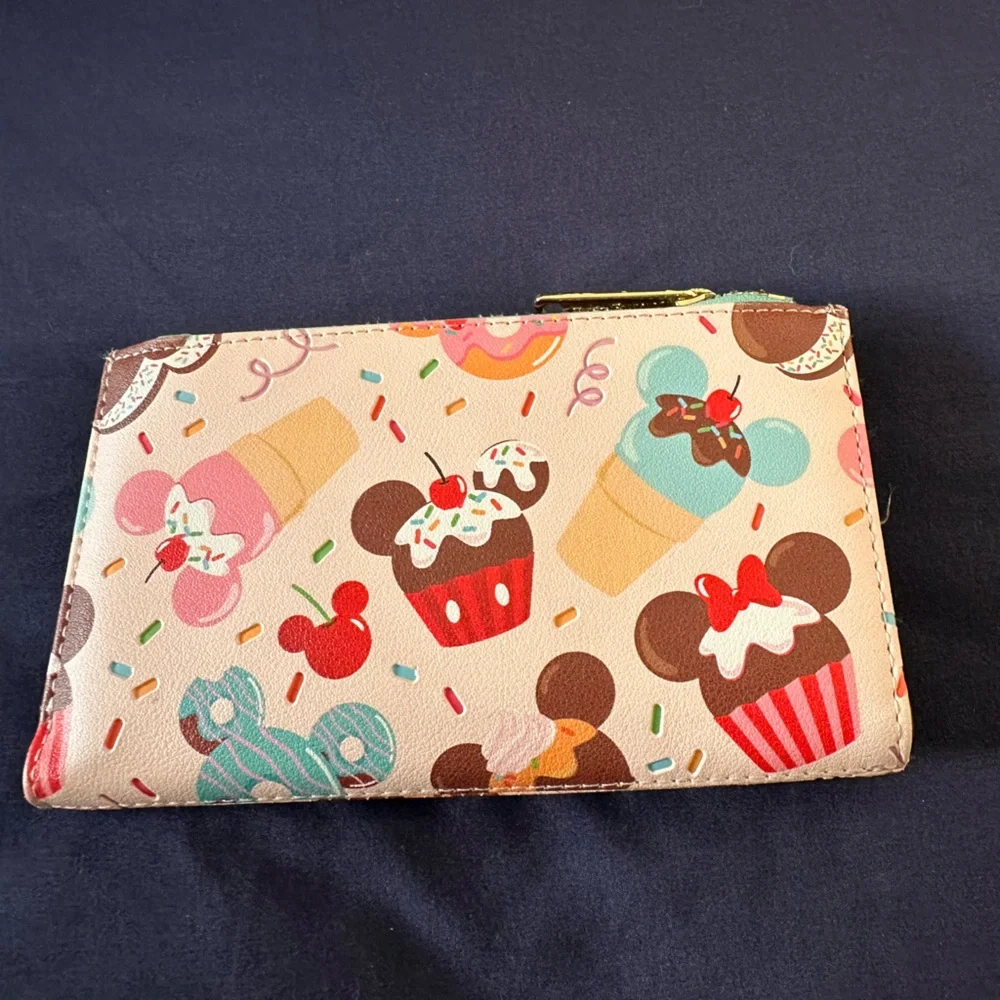 Lounge fly Mickey wallet 
Used
Please see pictures for wear and tear - Picture 2 of 5